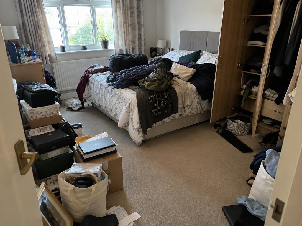 Illustrative bedroom decluttering — before cleaning