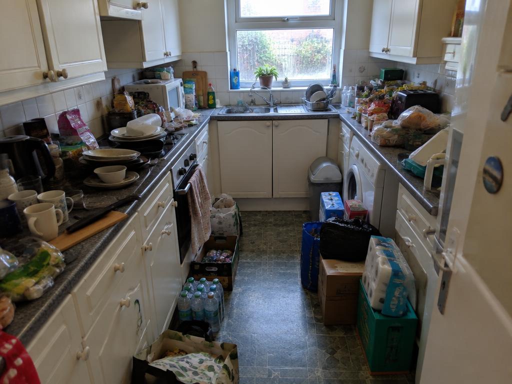 Illustrative kitchen hoarder clean-up — before cleaning